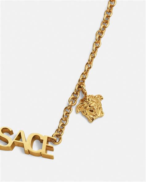 versace locket gold|versace logo jewelry.